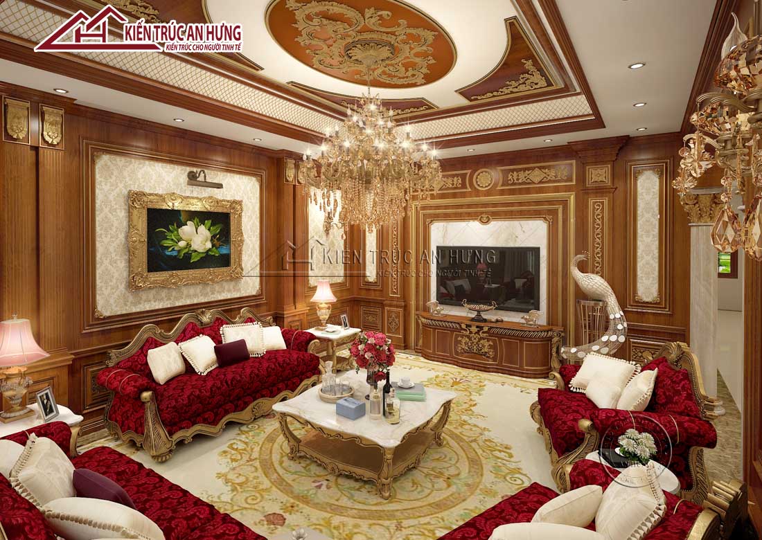 Tone màu chủ đạo của phòng khách là nâu gỗ sang trọng kết hợp với màu be nền nã. Nổi bật trên đó là tông màu đỏ booc-đô, vàng ánh kim mang vẻ đẹp hoàng gia, vương giả
